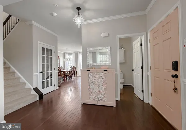 wooden floor and dining room with wooden floor and stairs