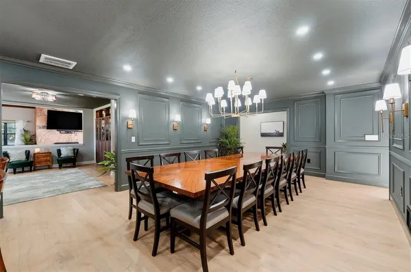 a kitchen with a stove cabinets and window