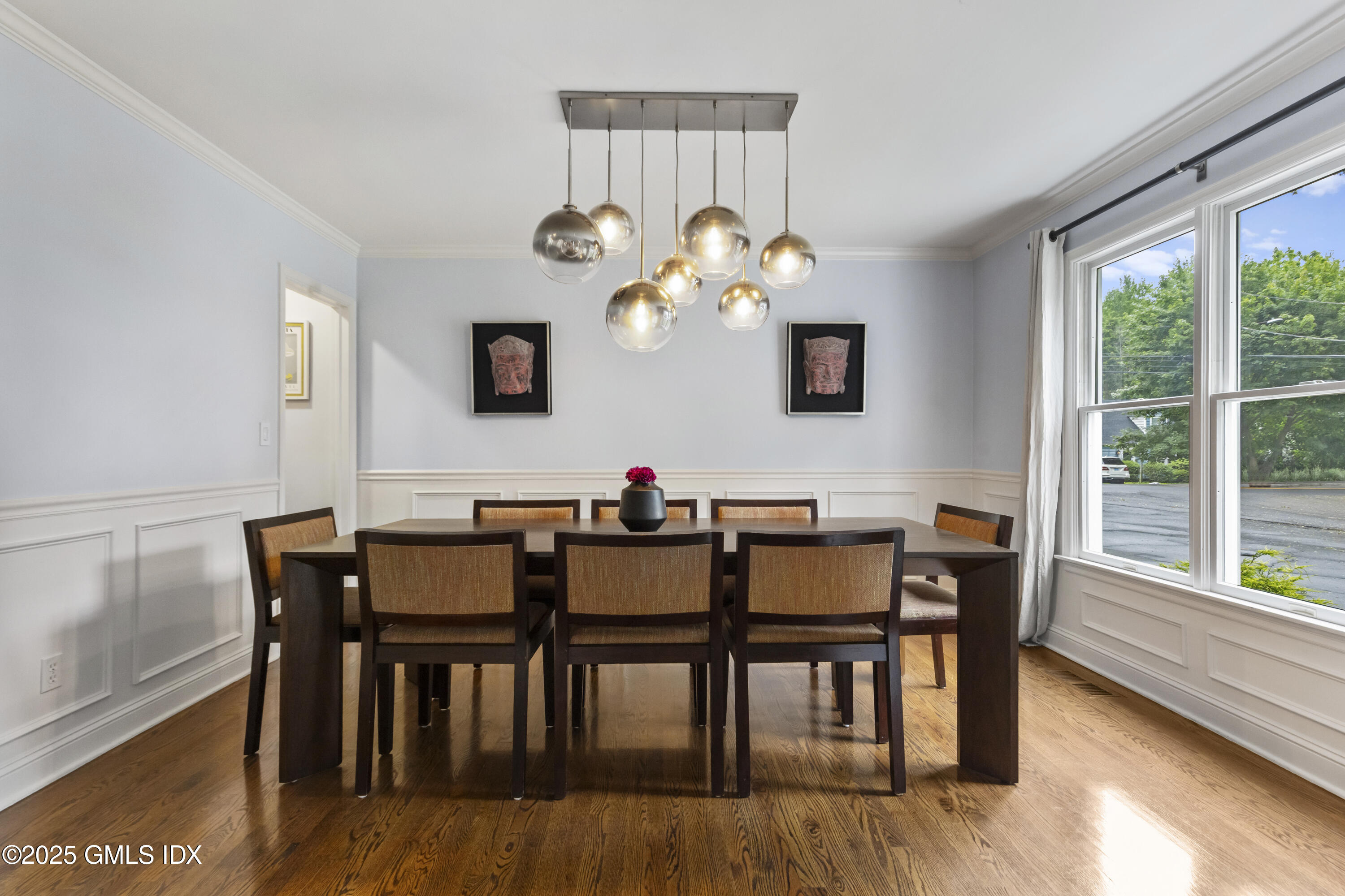 4 Tyler Lane Riverside, CT 06878 - Photo 2 of 27 a view of a dining room with furniture wooden floor and chandelier