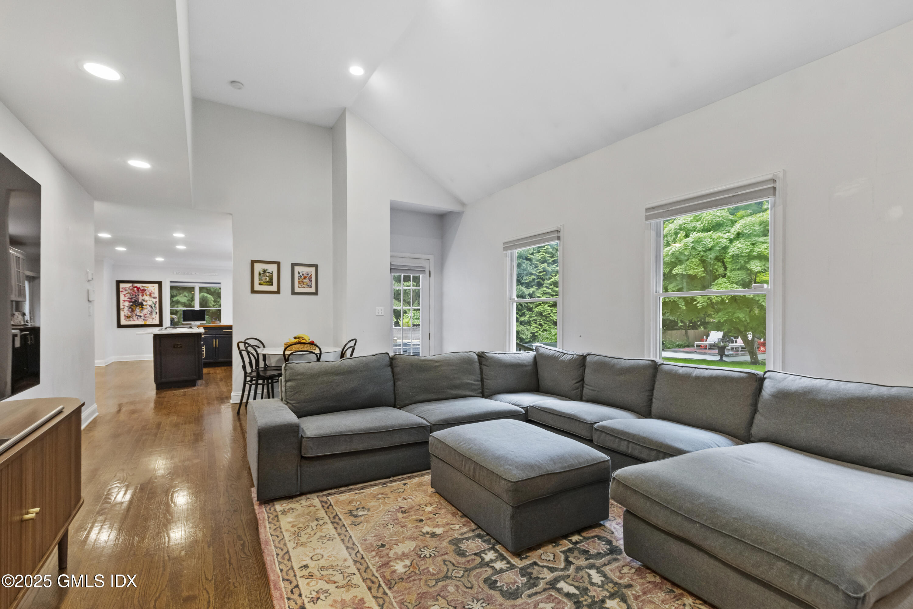 4 Tyler Lane Riverside, CT 06878 - Photo 9 of 27 a living room with furniture and a large window