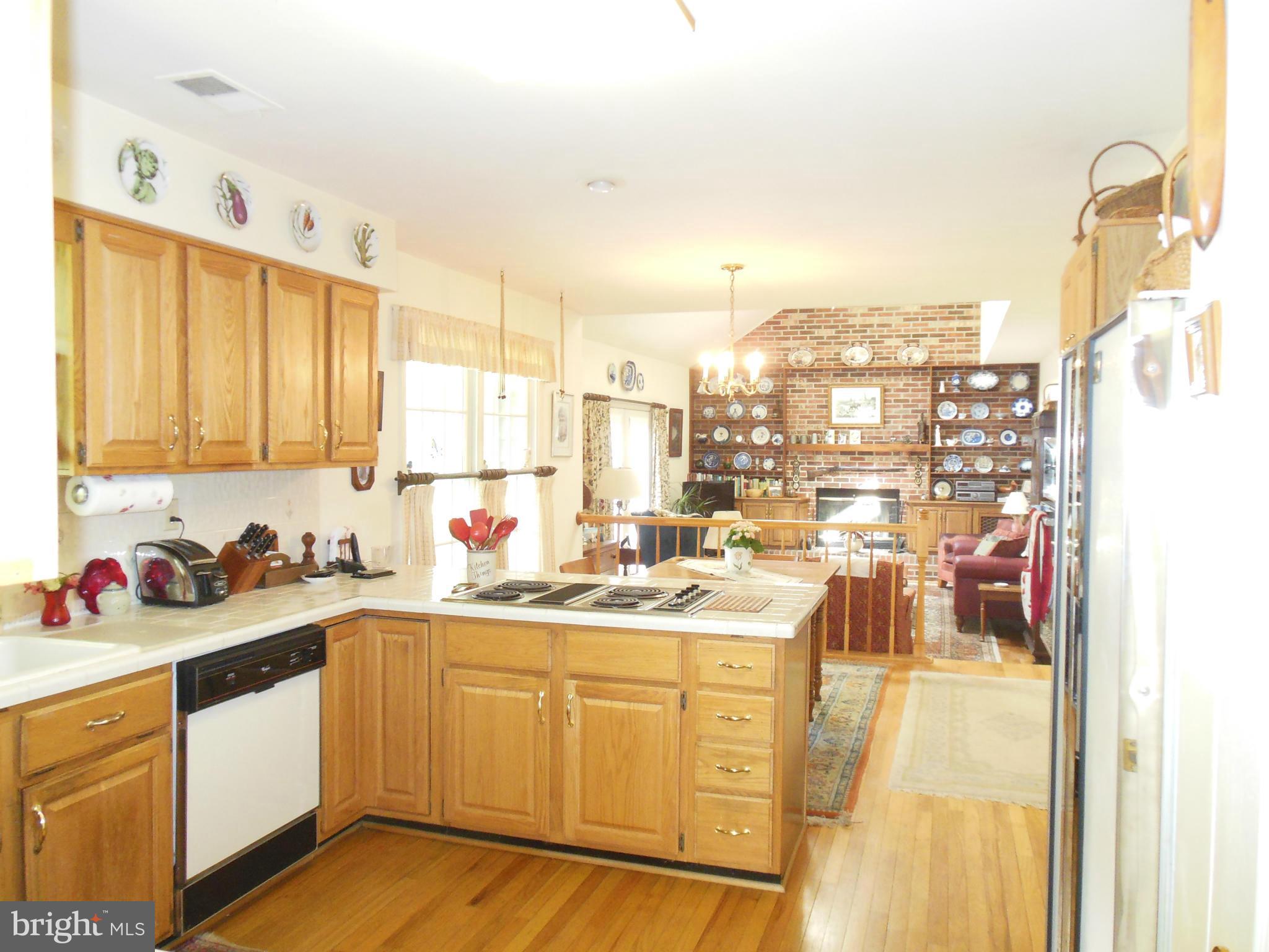 563 Laurel Court Riva, MD 21140 - Photo 12 of 30 a kitchen with a sink cabinets and window