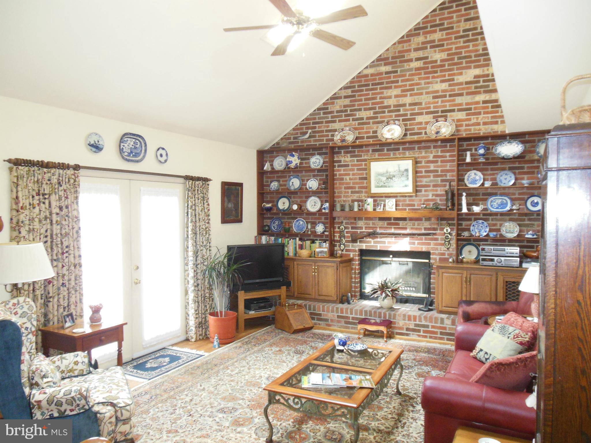 563 Laurel Court Riva, MD 21140 - Photo 13 of 30 a living room with furniture and a flat screen tv