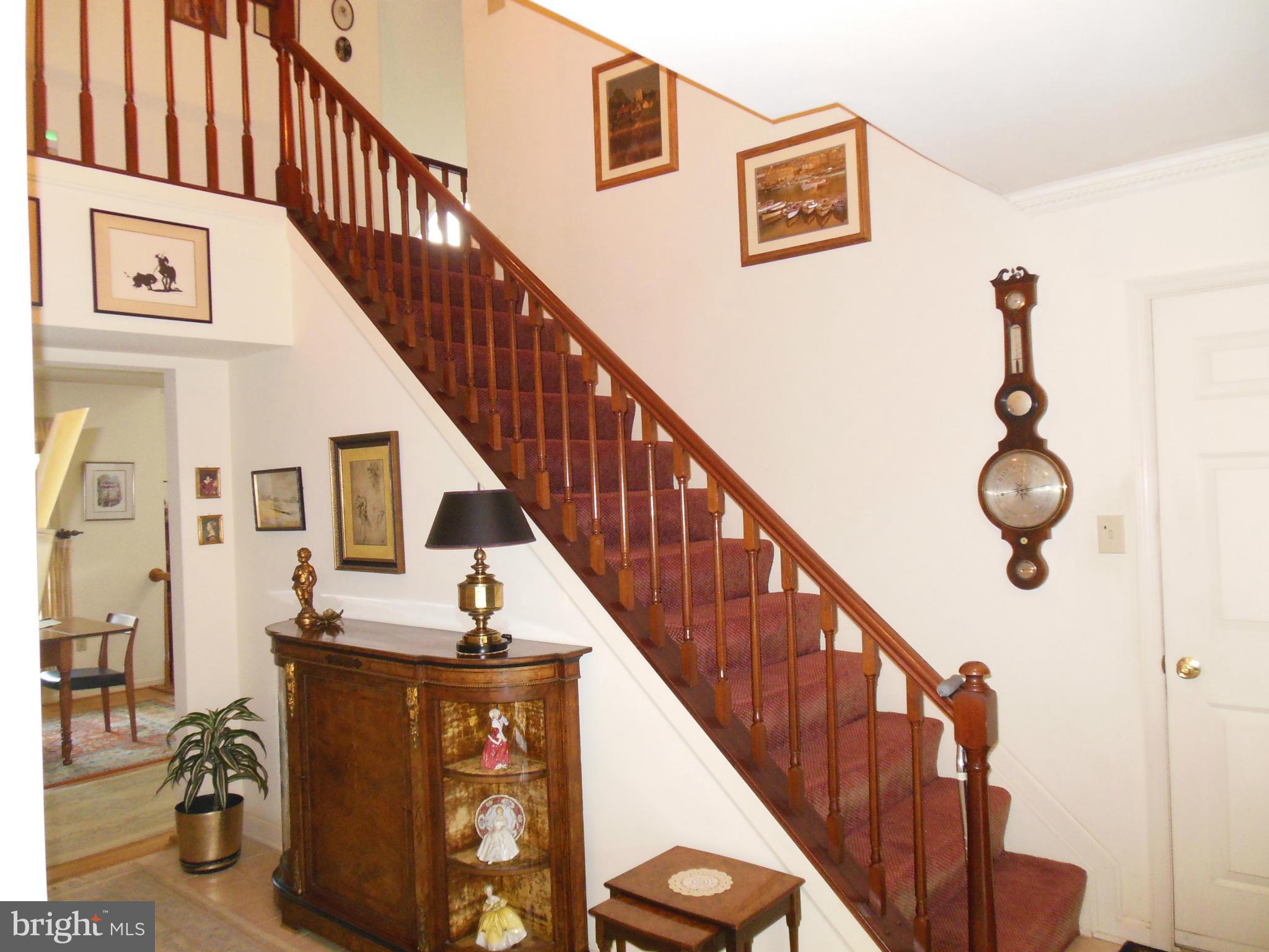 563 Laurel Court Riva, MD 21140 - Photo 15 of 30 a view of entryway and hall with wooden floor