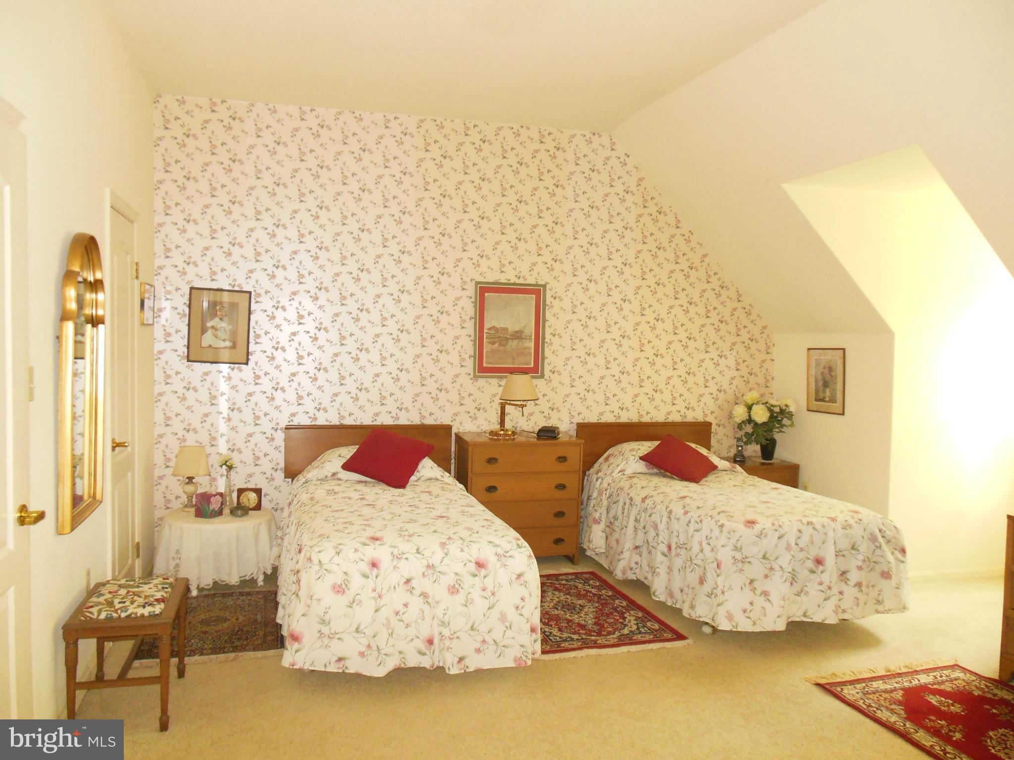 563 Laurel Court Riva, MD 21140 - Photo 16 of 30 a bedroom with two beds and painting on the wall