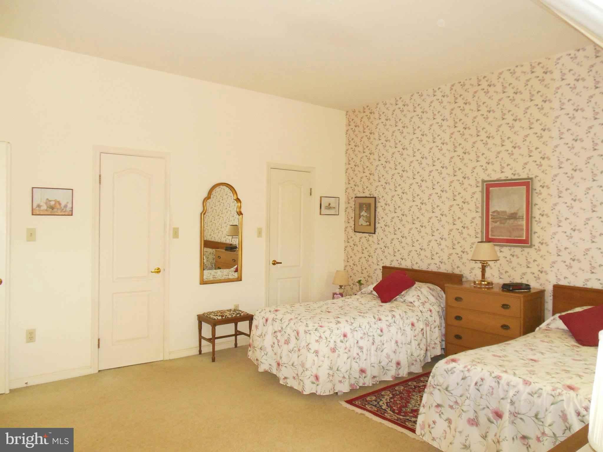 563 Laurel Court Riva, MD 21140 - Photo 17 of 30 a bedroom with two beds and painted walls