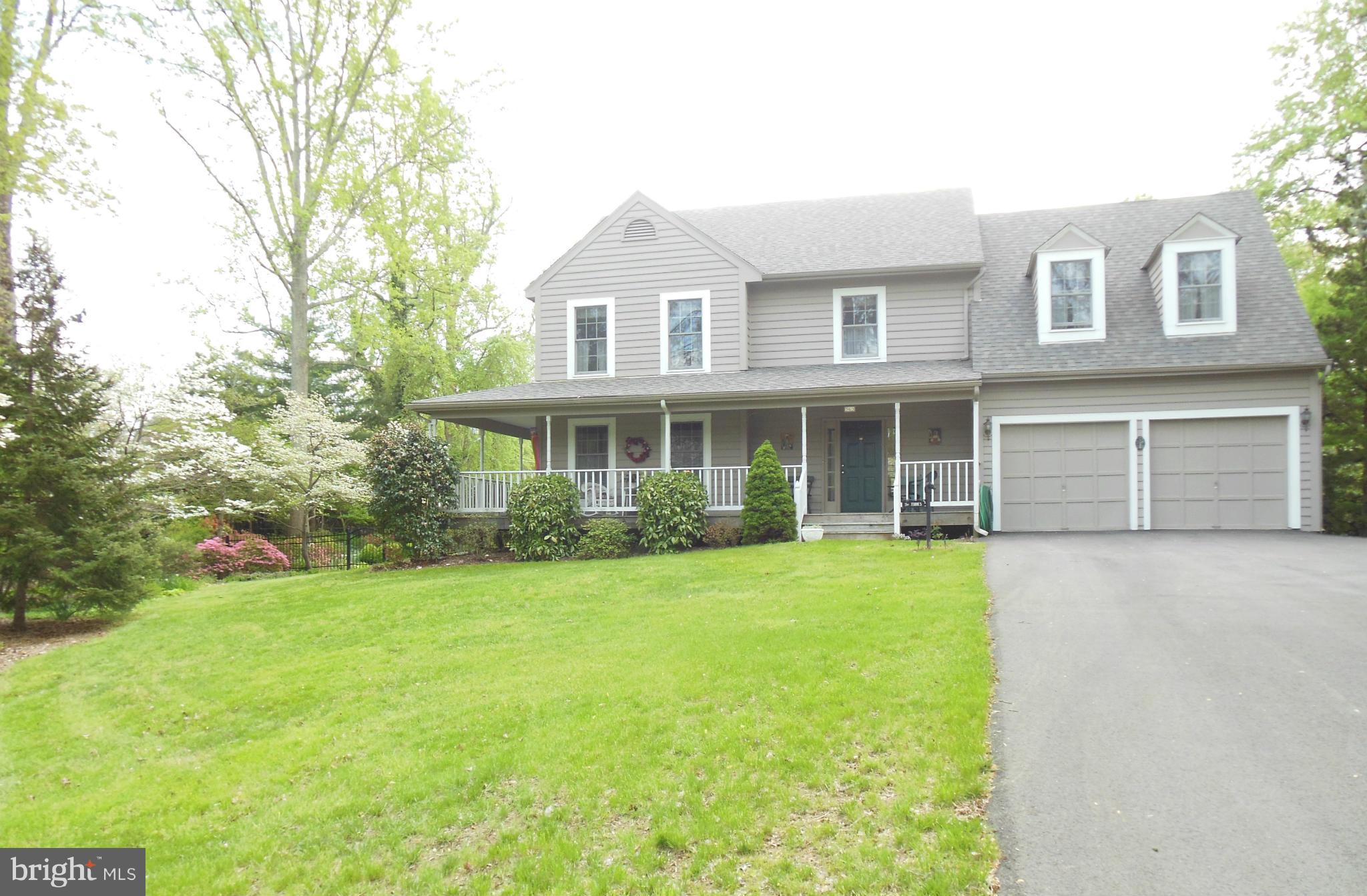 563 Laurel Court Riva, MD 21140 - Photo 27 of 30 a front view of a house with a garden and yard