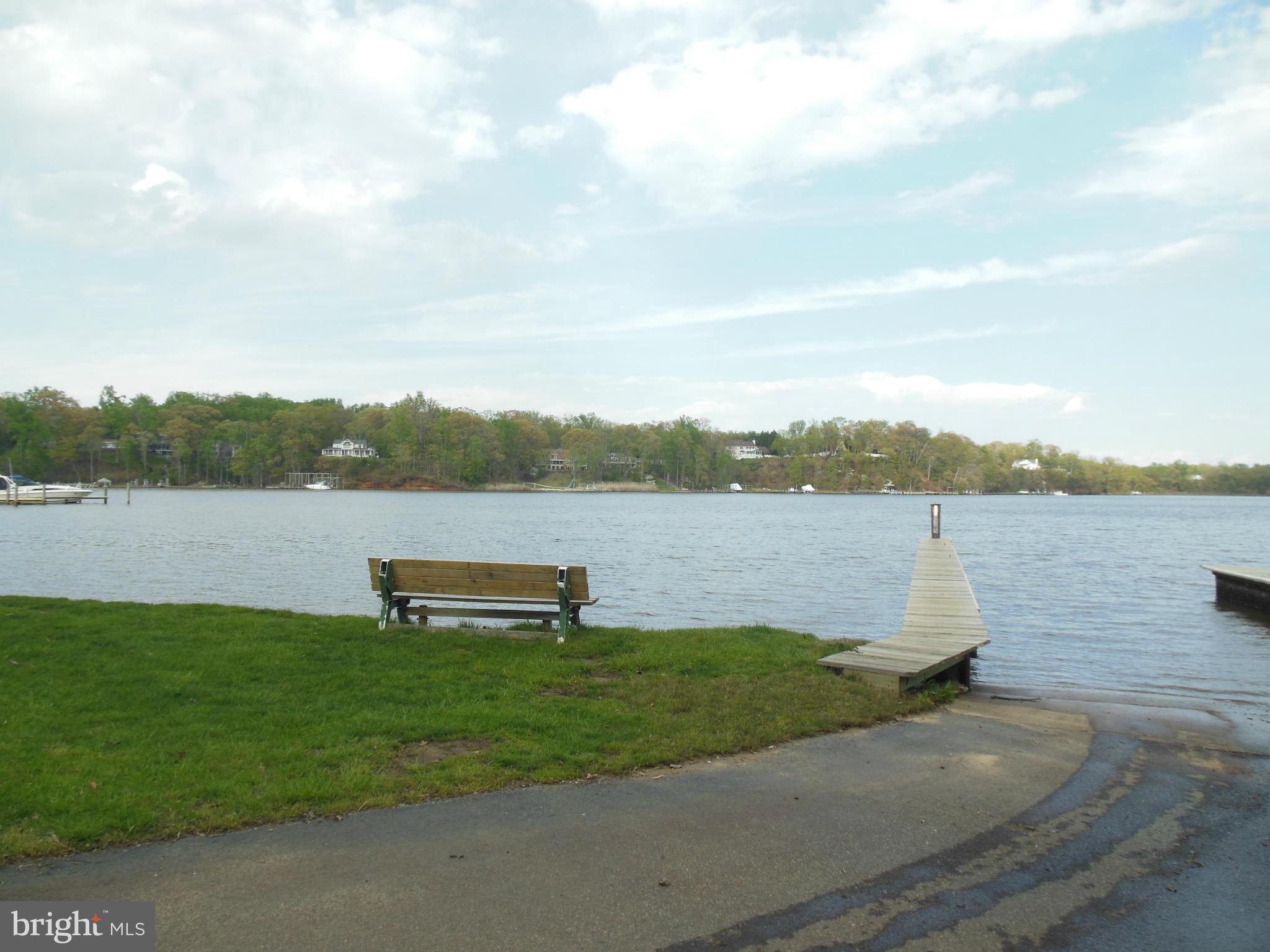 563 Laurel Court Riva, MD 21140 - Photo 29 of 30 a view of a lake with houses in the back