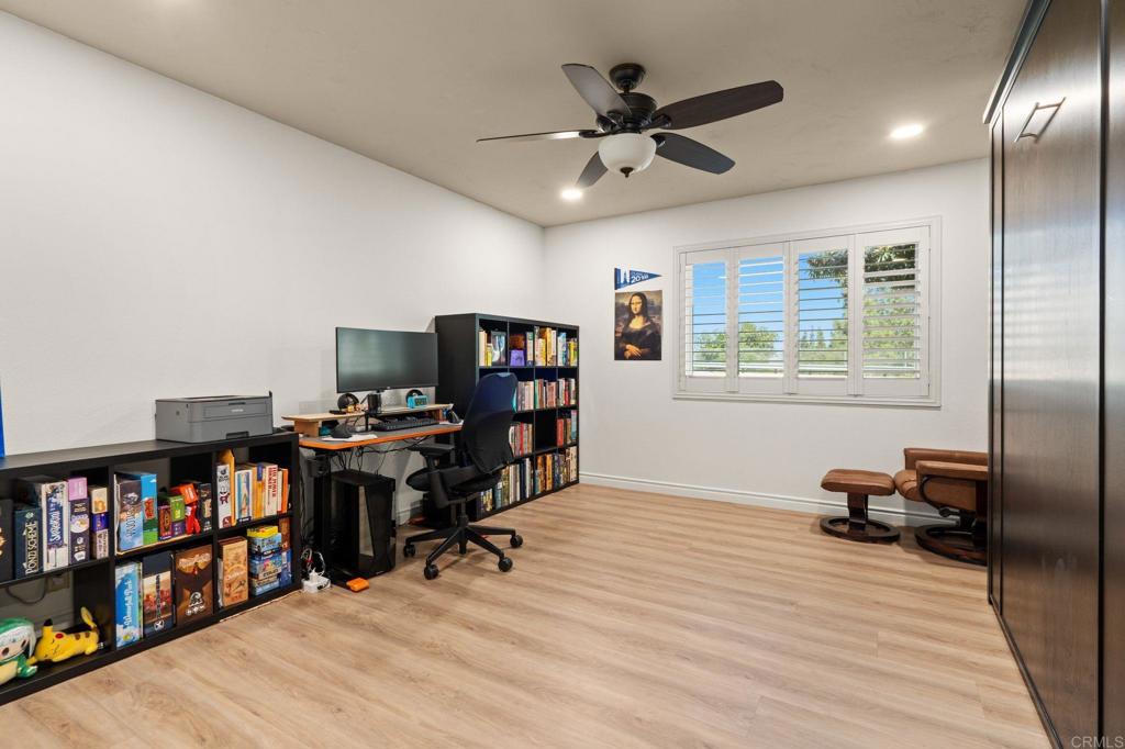 17597 Fairlie Road San Diego, CA 92128 - Photo 11 of 15 a view of a workspace with furniture and a window