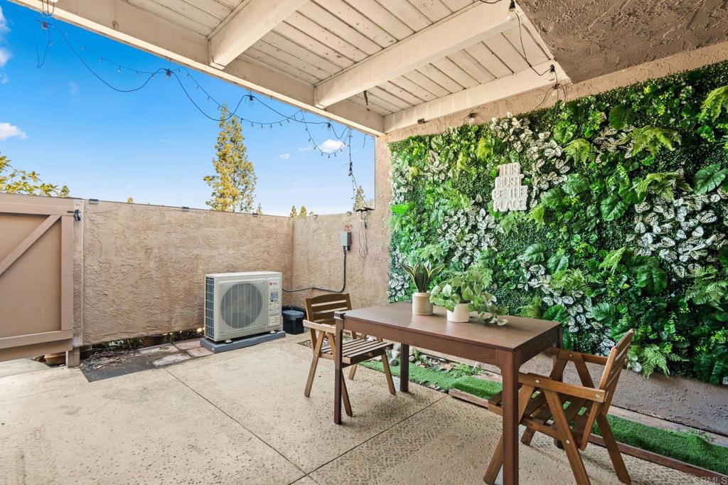 17597 Fairlie Road San Diego, CA 92128 - Photo 13 of 15 a backyard of a house with table and chairs