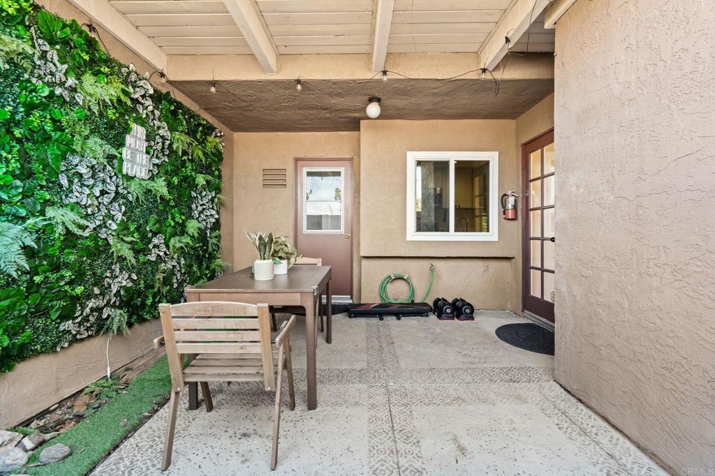 17597 Fairlie Road San Diego, CA 92128 - Photo 14 of 15 a balcony with chairs and a stove