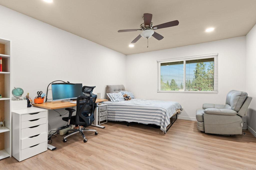 17597 Fairlie Road San Diego, CA 92128 - Photo 10 of 15 a bedroom with furniture and a window