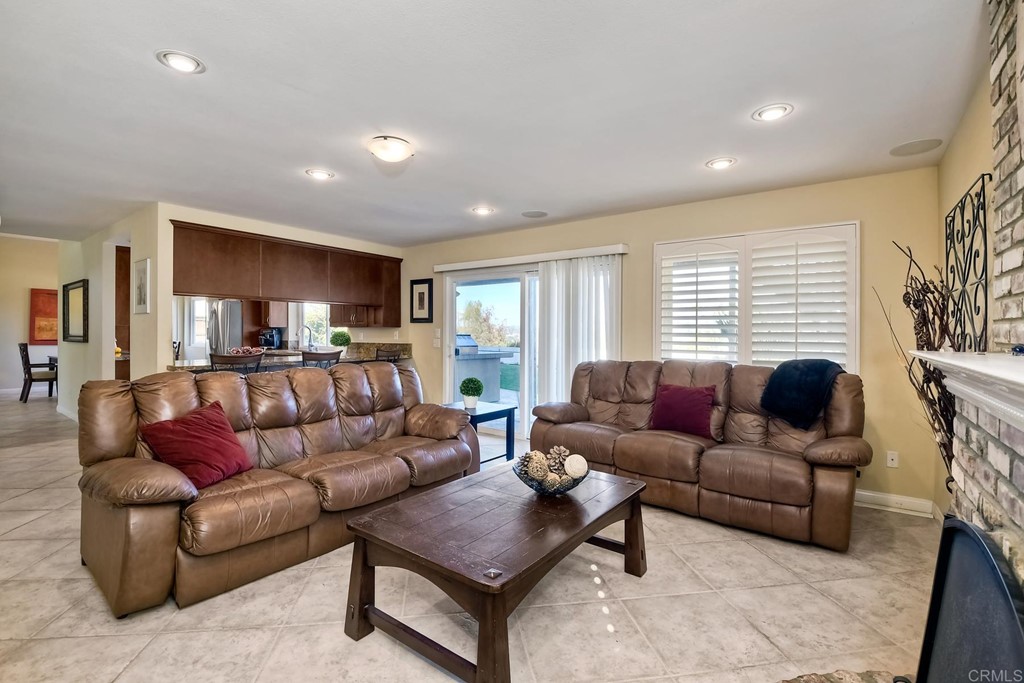 2754 Olympia Drive Carlsbad, CA 92010 - Photo 11 of 35 a living room with furniture and a window