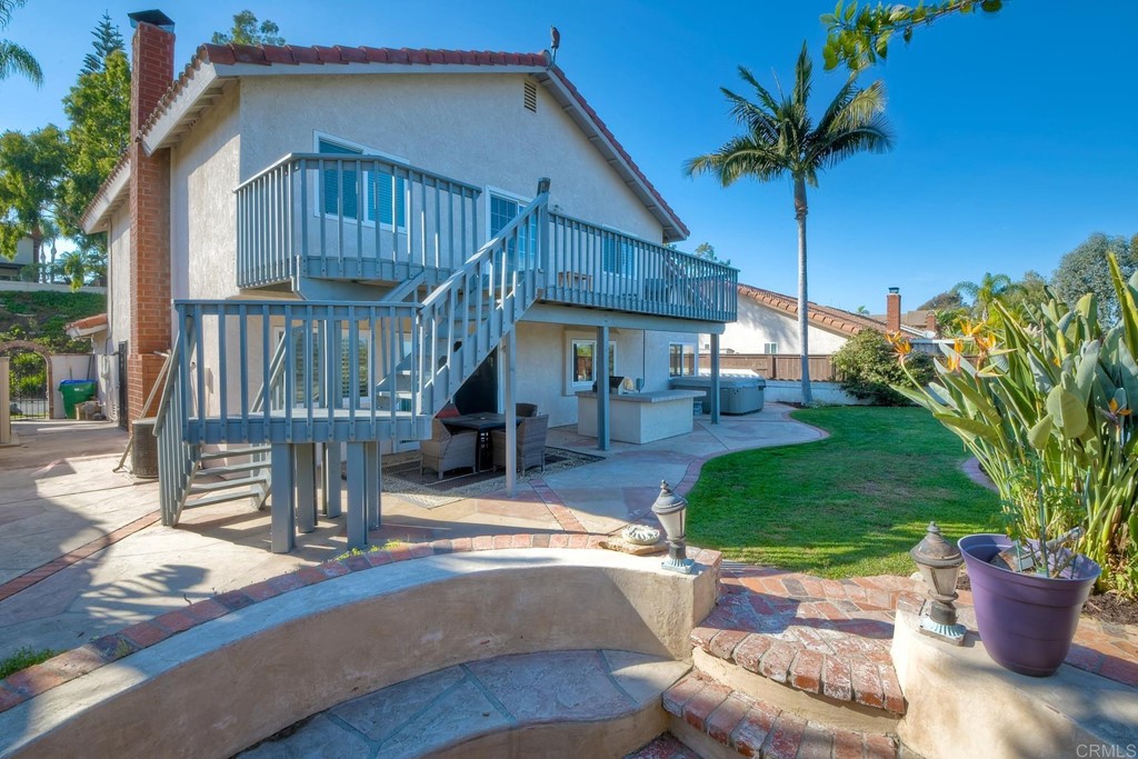 2754 Olympia Drive Carlsbad, CA 92010 - Photo 17 of 35 a front view of house with yard outdoor seating and green space