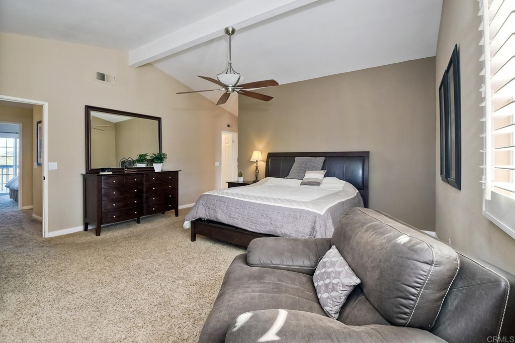 2754 Olympia Drive Carlsbad, CA 92010 - Photo 19 of 35 a bedroom with a bed dresser and a window