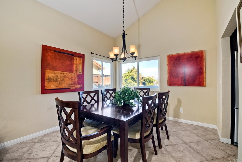 2754 Olympia Drive Carlsbad, CA 92010 - Photo 4 of 35 a view of a dining room with furniture window and outside view