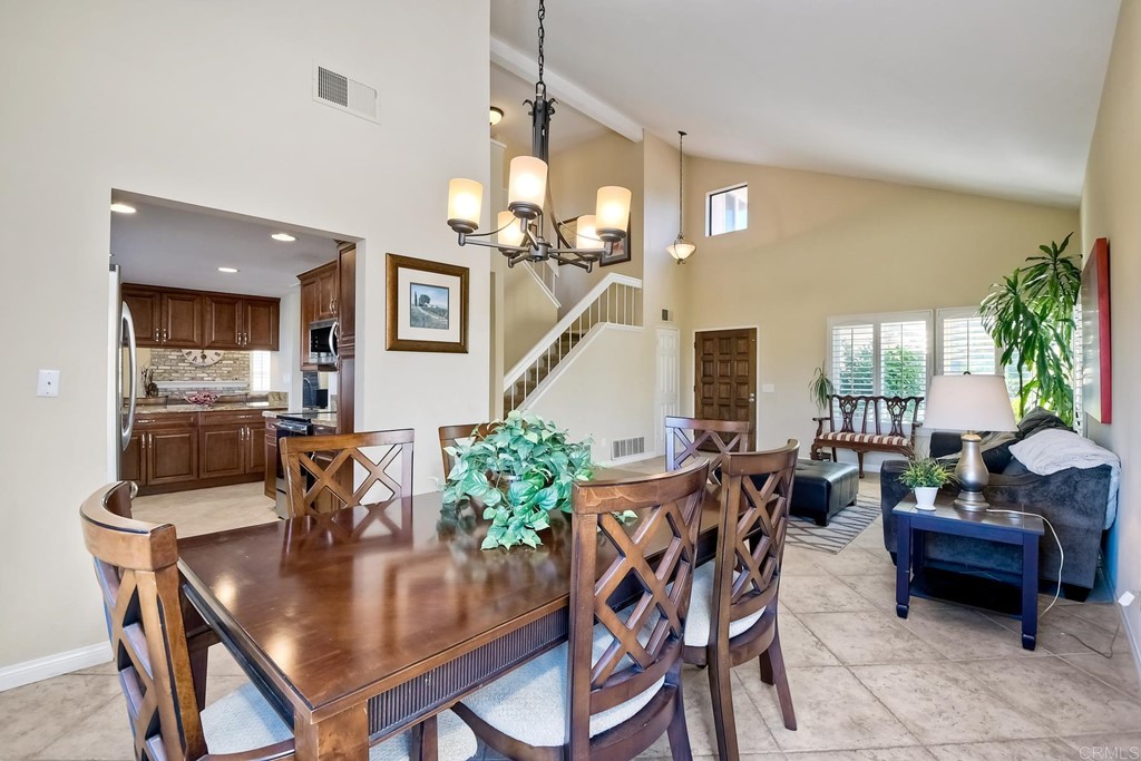 2754 Olympia Drive Carlsbad, CA 92010 - Photo 5 of 35 a dining room with furniture and wooden floor