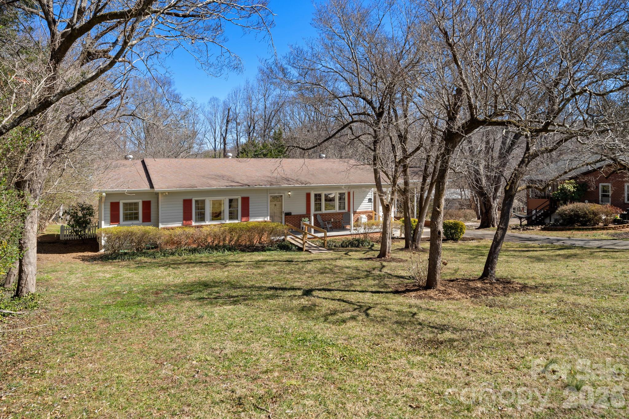 186 Tanner Street Rutherfordton, NC 28139 - Photo 2 of 39 a front view of a house with a yard