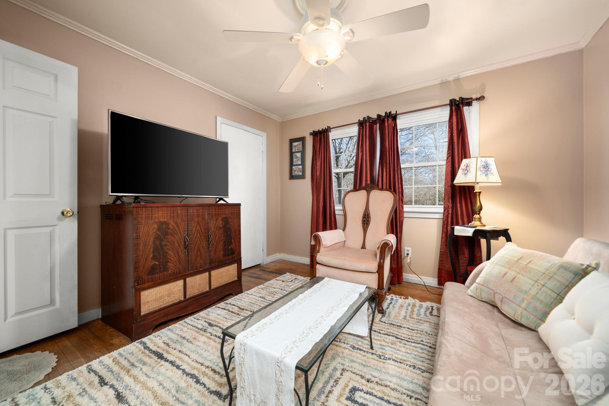 186 Tanner Street Rutherfordton, NC 28139 - Photo 21 of 39 a living room with furniture and a flat screen tv
