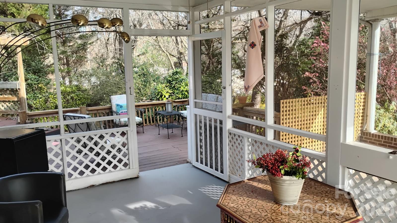 186 Tanner Street Rutherfordton, NC 28139 - Photo 25 of 39 a balcony with furniture and flowers