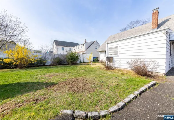 a bathroom with a sink and a yard