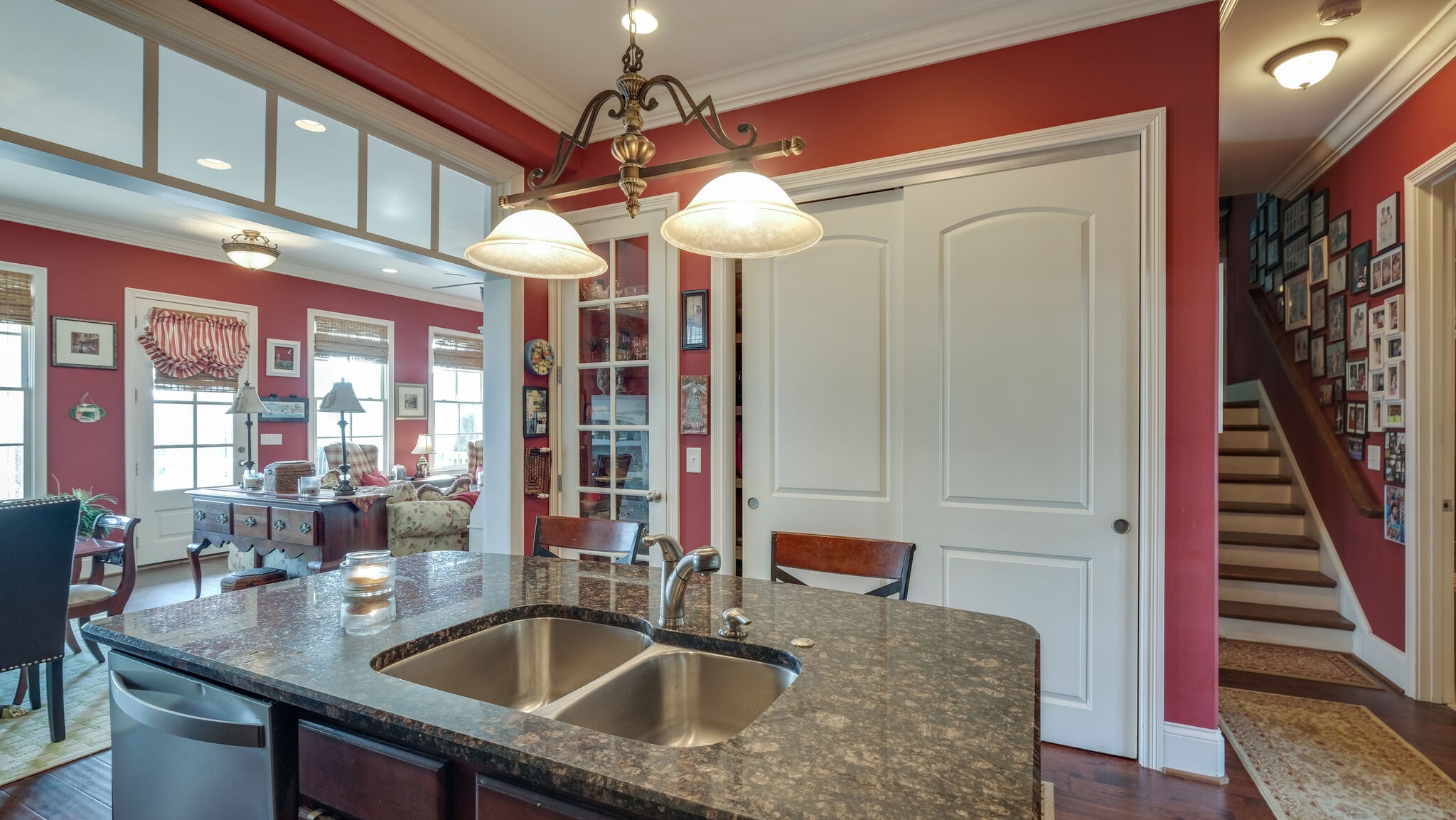 1011 Rural Plains Circle Franklin, TN 37064 - Photo 14 of 36 a kitchen with stainless steel appliances granite countertop a sink a oven and a dining table