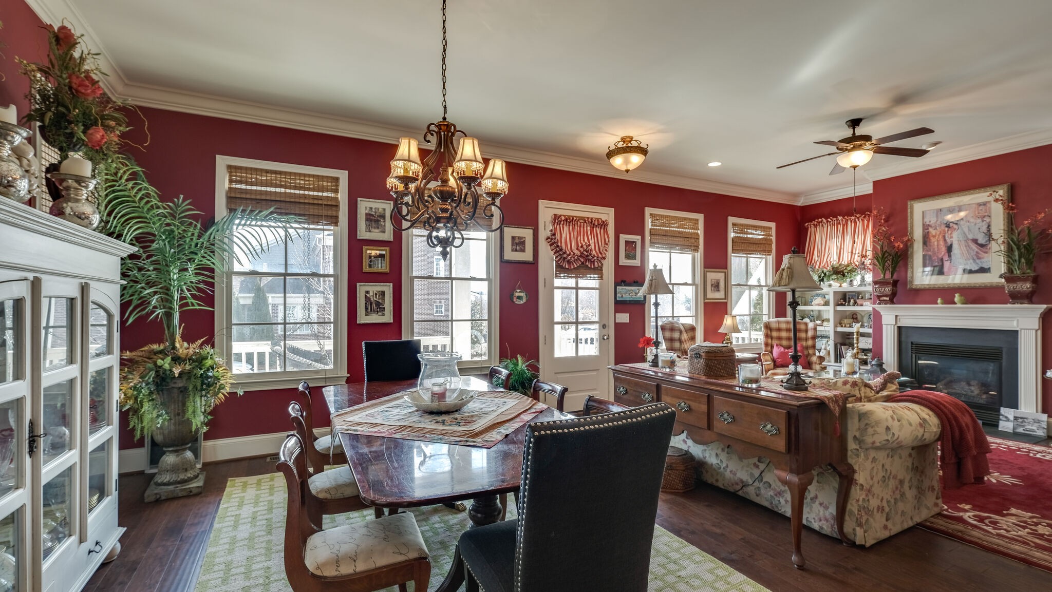 1011 Rural Plains Circle Franklin, TN 37064 - Photo 19 of 36 a living room with fireplace furniture and a chandelier