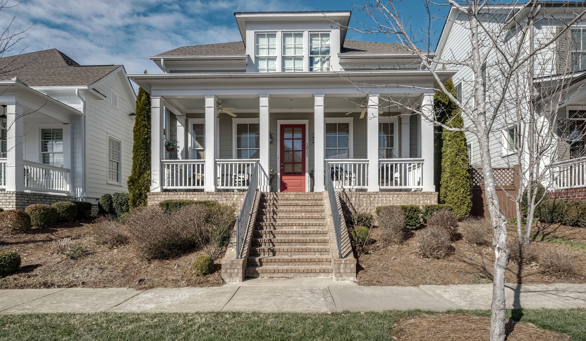 1011 Rural Plains Circle Franklin, TN 37064 - Photo 21 of 36 a front view of a house with a yard