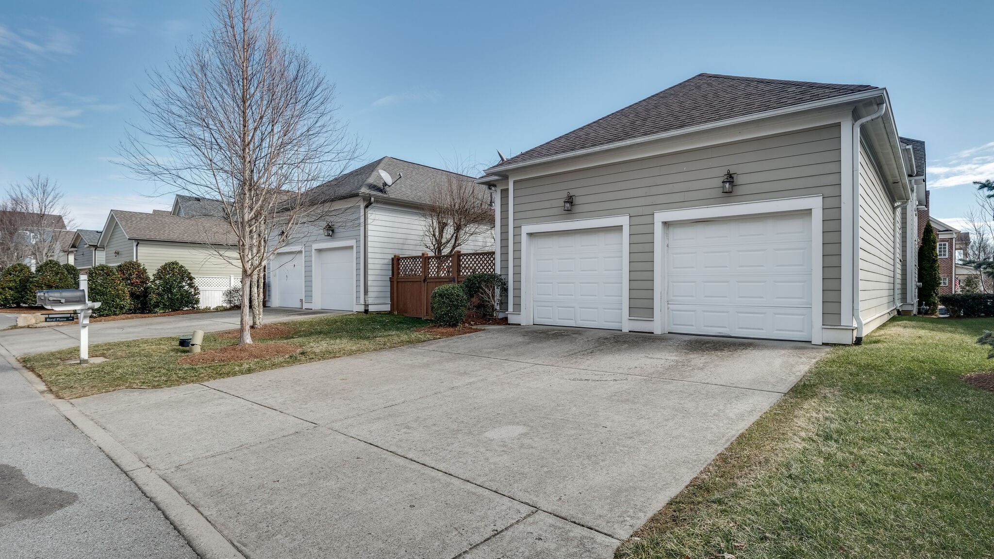 1011 Rural Plains Circle Franklin, TN 37064 - Photo 23 of 36 a view of a white house with a large space in front of it