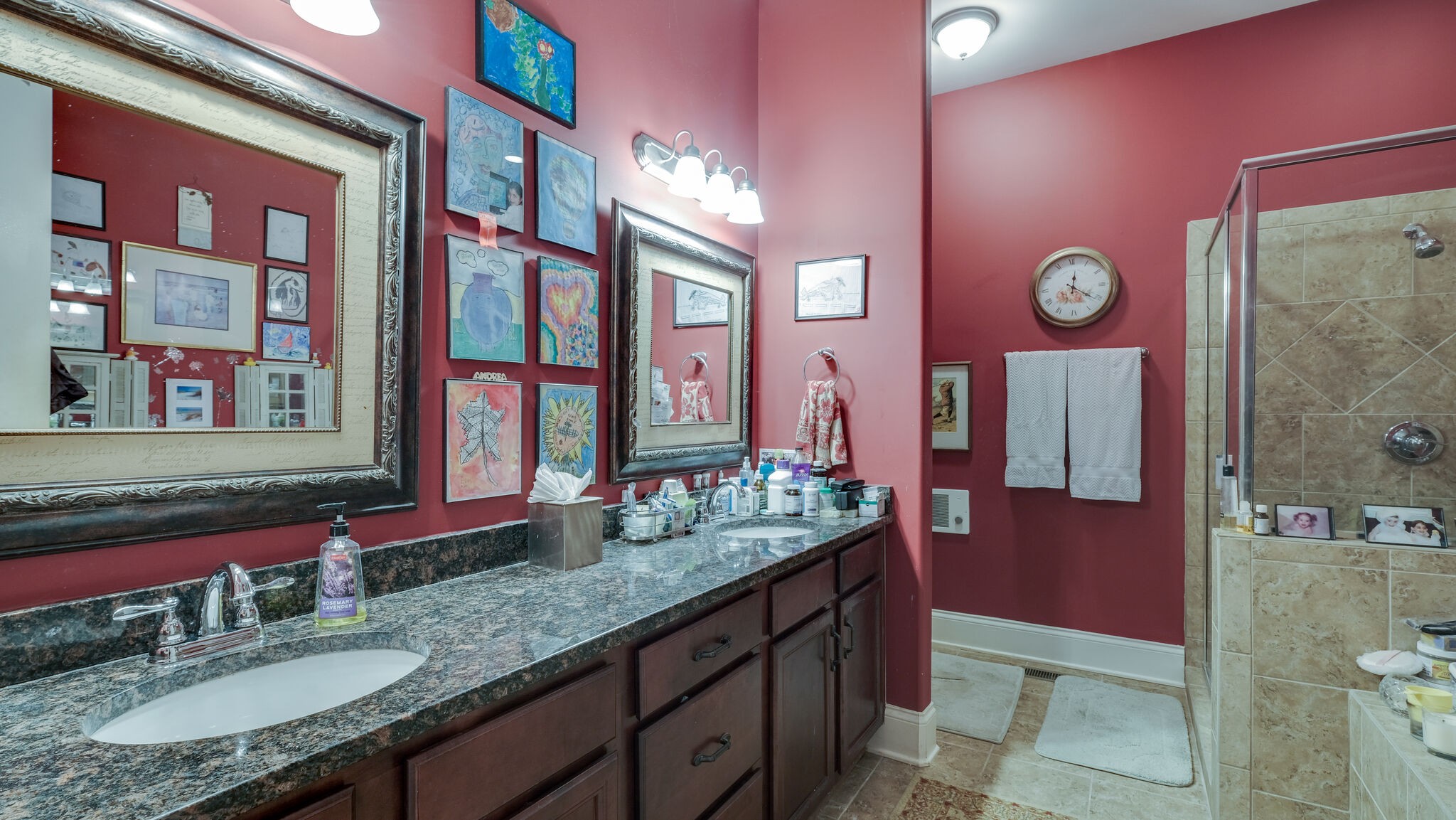 1011 Rural Plains Circle Franklin, TN 37064 - Photo 28 of 36 a bathroom with double vanity and a mirror
