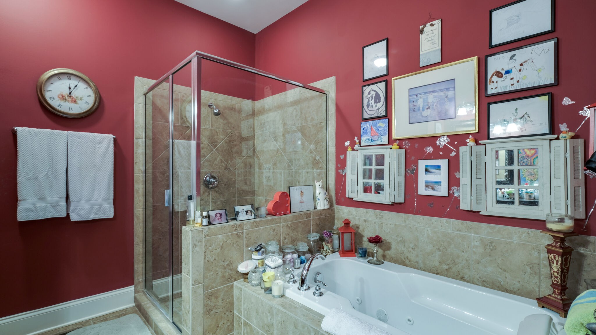 1011 Rural Plains Circle Franklin, TN 37064 - Photo 29 of 36 a bathroom with a bathtub a shower and a mirror