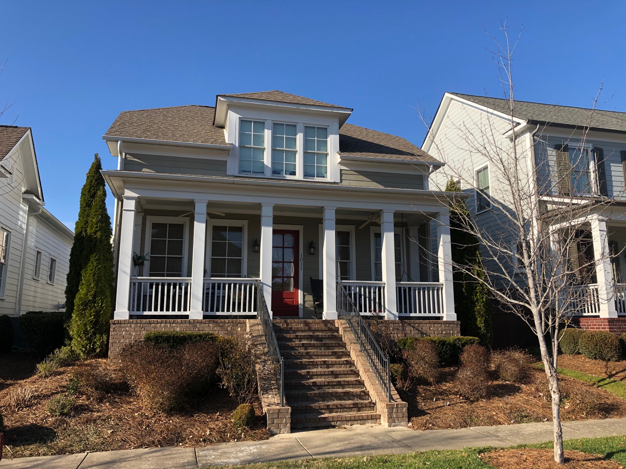 1011 Rural Plains Circle Franklin, TN 37064 - Photo 32 of 36 a front view of a house with a yard