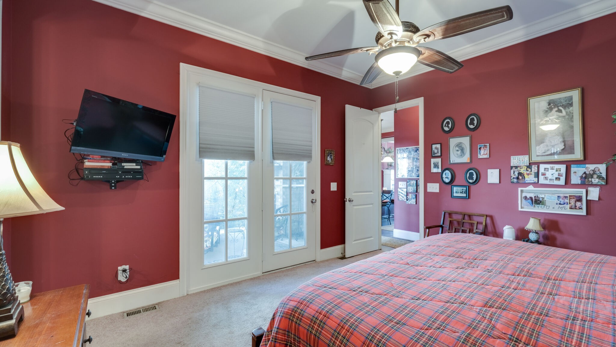 1011 Rural Plains Circle Franklin, TN 37064 - Photo 36 of 36 a bedroom with a bed and a flat screen tv