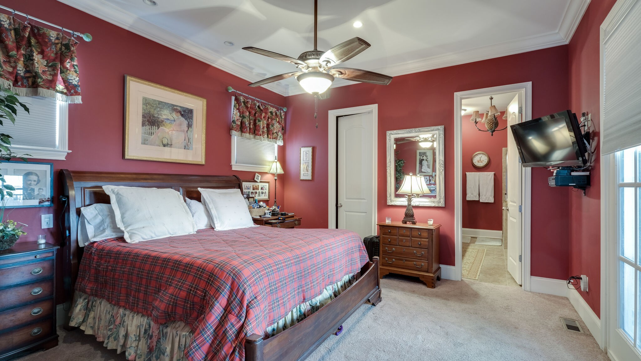 1011 Rural Plains Circle Franklin, TN 37064 - Photo 6 of 36 a bedroom with a bed and a chandelier