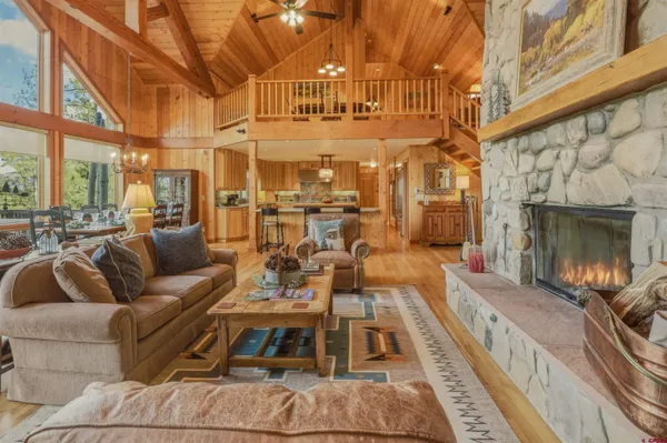 a view of a living room filled with furniture