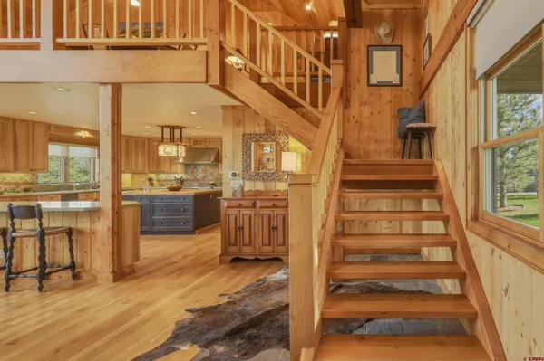a view of a living room with an entryway