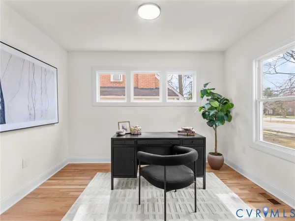 a view of a dining room with furniture