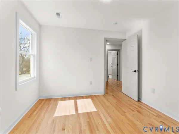 a bathroom with a sink a vanity and a mirror