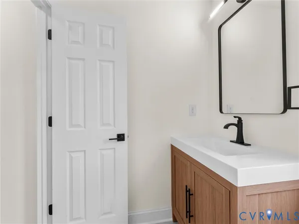 a view of a house with a yard and garage