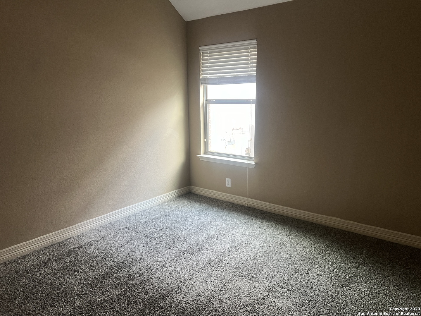 2431 Tremonto San Antonio, TX 78261 - Photo 13 of 21 an empty room with a window