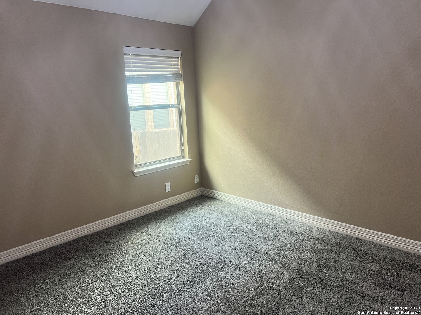 2431 Tremonto San Antonio, TX 78261 - Photo 15 of 21 an empty room with a window