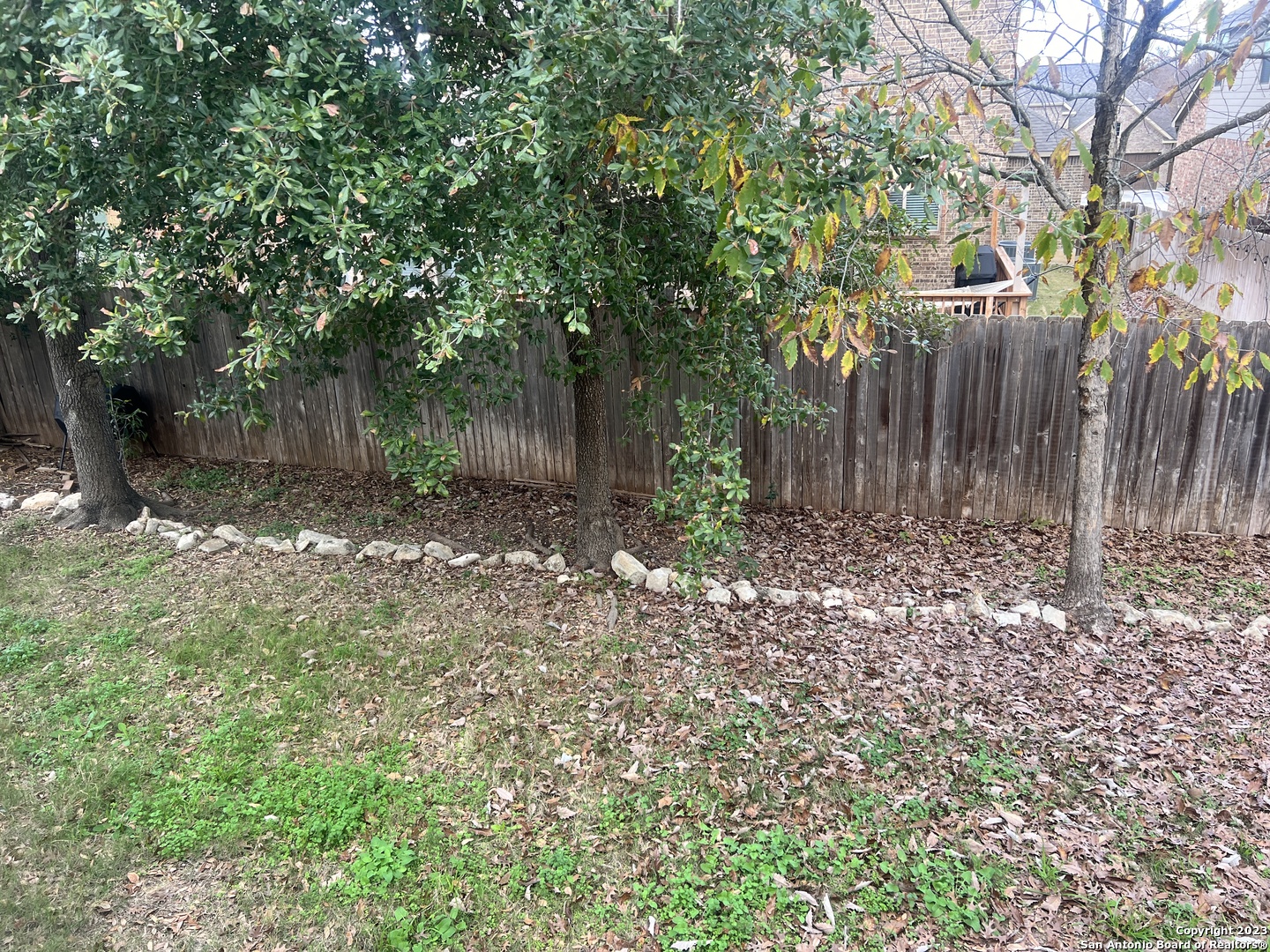 2431 Tremonto San Antonio, TX 78261 - Photo 20 of 21 a backyard of a house with lots of green space
