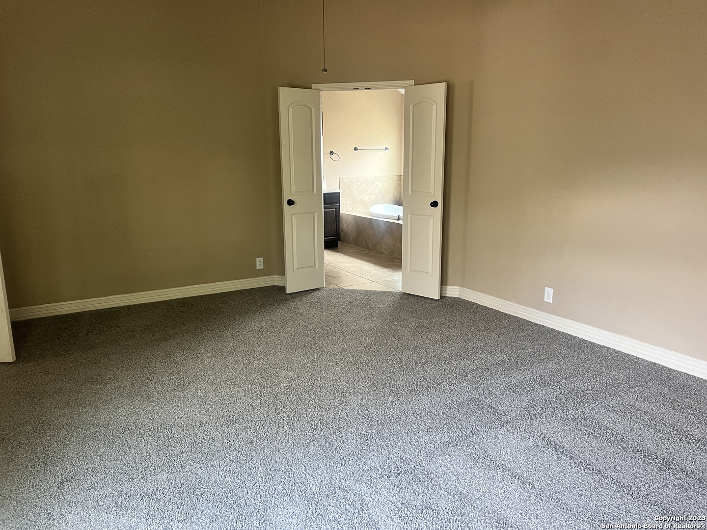 2431 Tremonto San Antonio, TX 78261 - Photo 8 of 21 an empty room with a bathroom