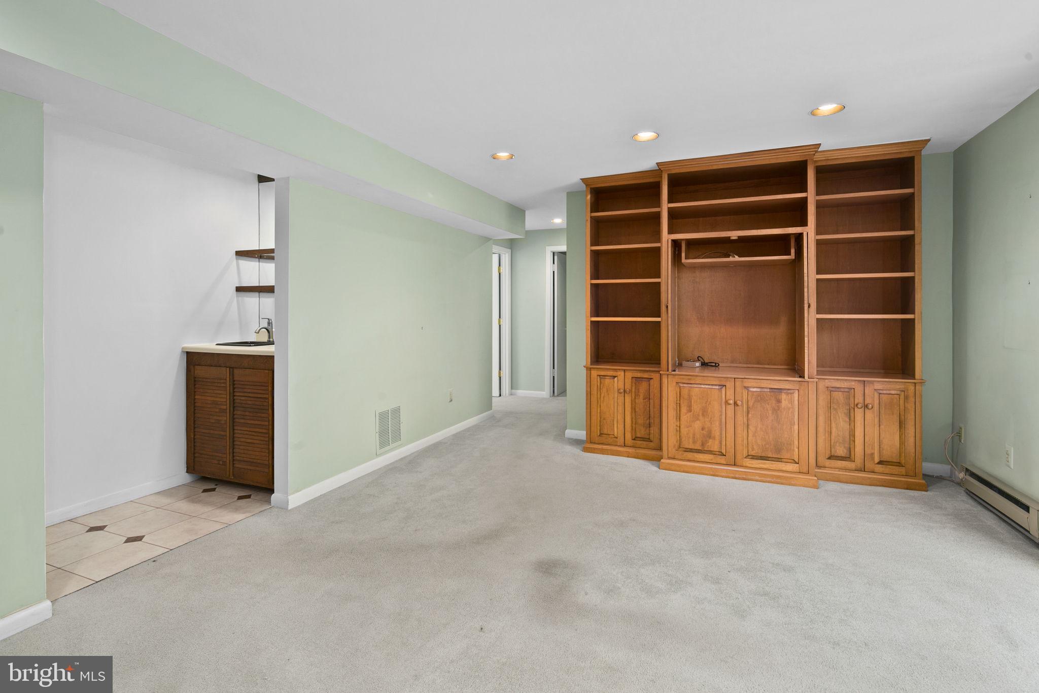 8716 Center Road Springfield, VA 22152 - Photo 30 of 43 Wet bar and mini fridge