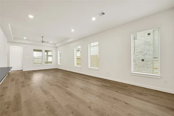 a kitchen with stainless steel appliances granite countertop white cabinets sink and stainless steel appliances