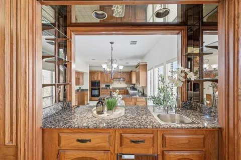 a view of a counter top kitchen