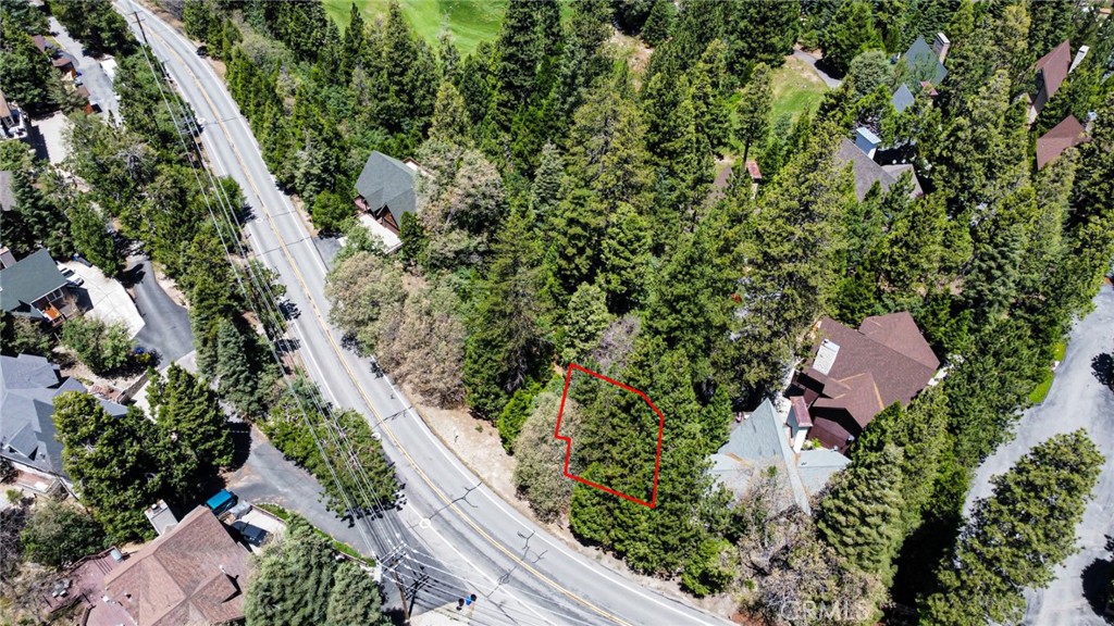 180 Grass Valley Road, Unit 5 Lake Arrowhead, CA 92352 - Photo 7 of 12 an aerial view of house with yard