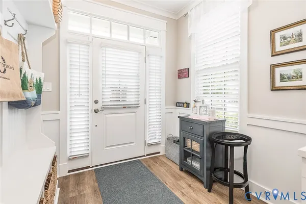 a kitchen with stainless steel appliances granite countertop a stove and a refrigerator