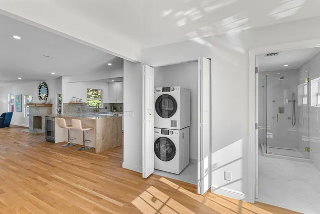 a view of a kitchen cabinets and wooden floor