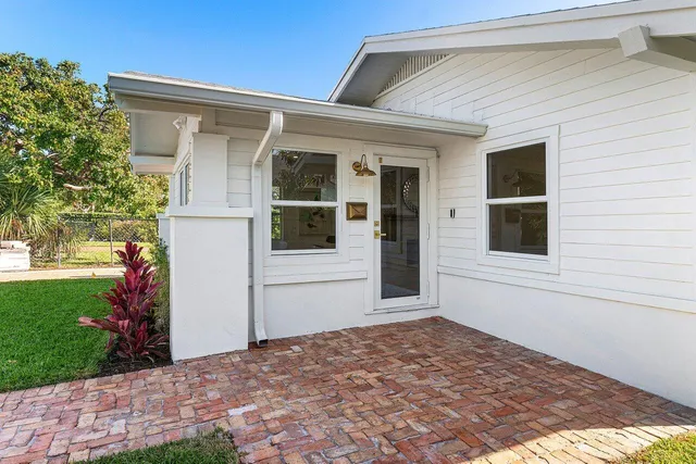 a view of a backyard of the house