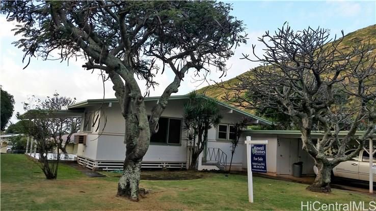 6027 Aimoku Street Honolulu, HI 96821 - Photo 1 of 1 a view of a park with a tree